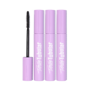 Three lavender tubes of Totally Tubular Tubing Mascara with one tube opened to show the applicator wand.