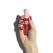 pink instant crush lip gloss tube in hand with pink nails - Glossy Set - Half Caked