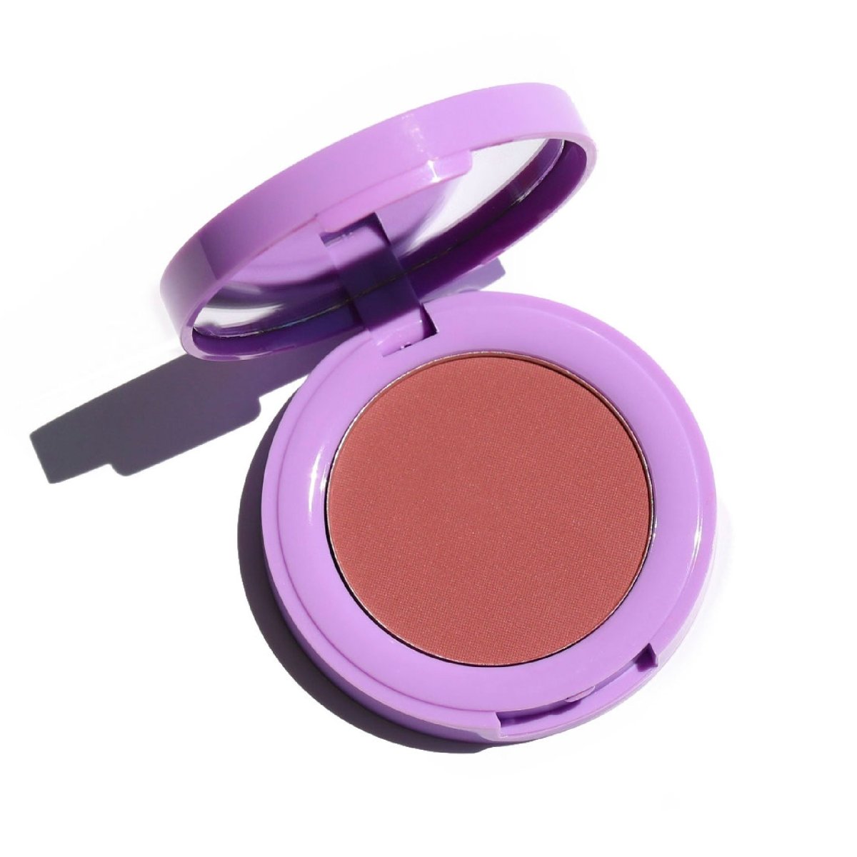 purple compact with mirror and mauve pan -In Bloom Powder Blush, day 'n' nite - Half Caked