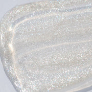 Swatch of clear lip gloss with shimmer - Instant Crush - Sparkle Motion - Half Caked