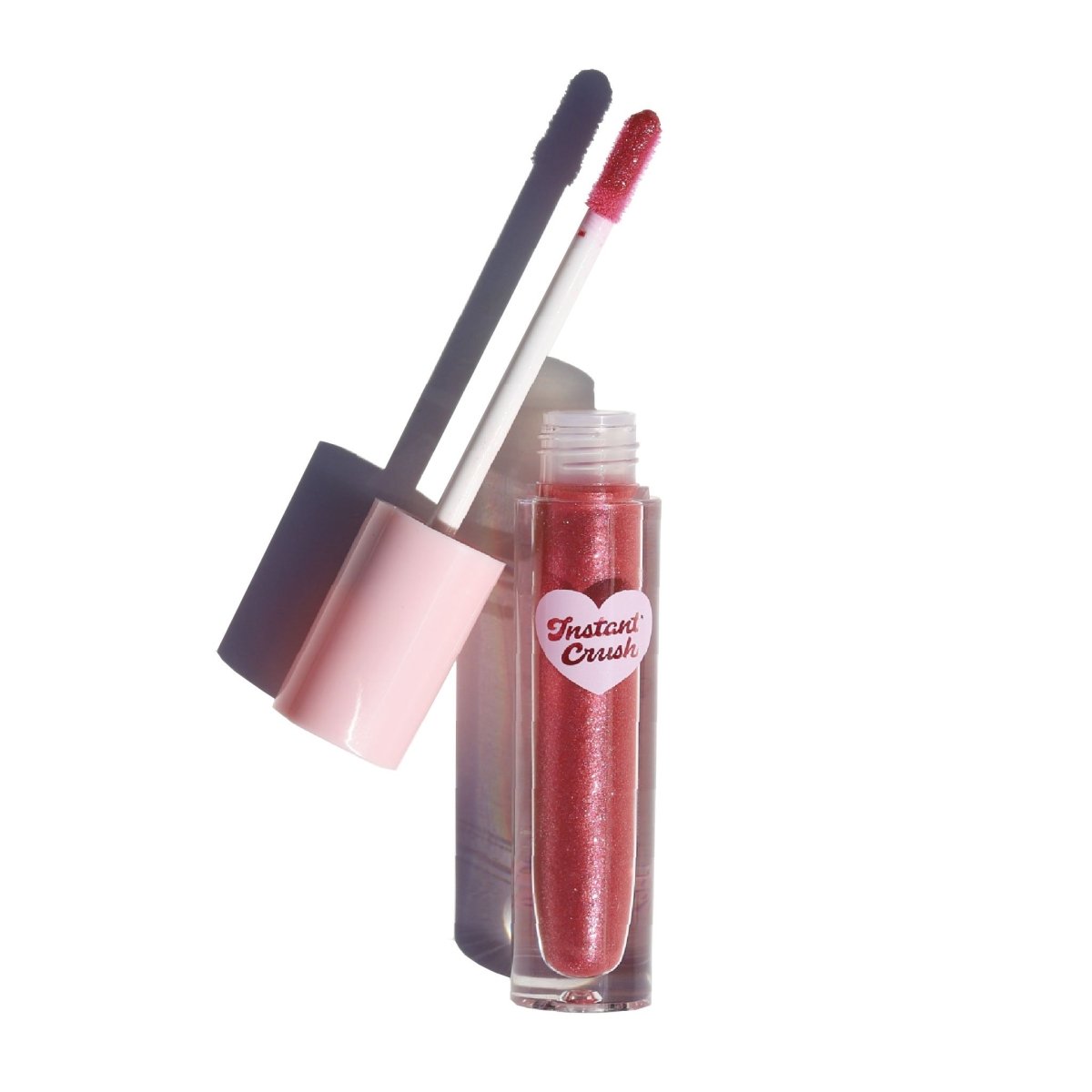 Open pink tube with berry shimmer - Instant Crush Lip Gloss - Caught Up - Half Caked