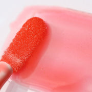 Sponge applicator in sheer orange tint - 5% Tint - Instant Crush Lip Gloss - Half Caked