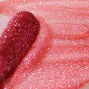 Close up of berry lip gloss with pink shimmers - Caught Up - Instant Crush - Half Caked