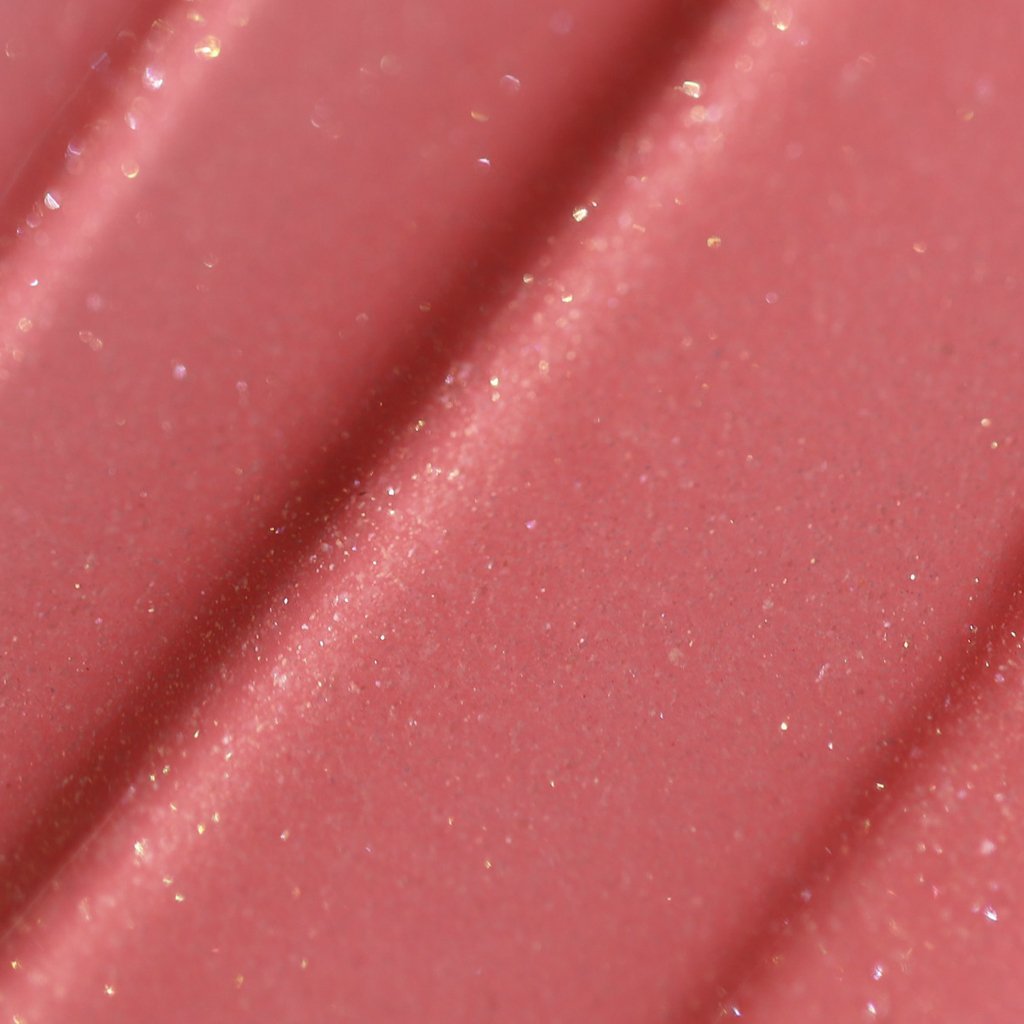 Macro swatch of nude lip gloss with shimmer - Instant Crush- Lucky Charm - Half Caked