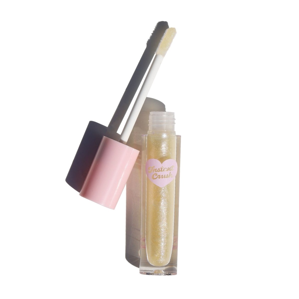 Clear lip gloss with shimmer in a pink tube - Instant Crush - Sparkle Motion - Half Caked