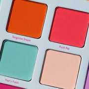 closeup of colorful orange pink turquoise matte eyeshadow - Snack Pack - Half Caked