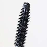 closeup of black plastic cone mascara applicator - Totally Tubular Bundle - Half Caked