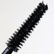 closeup of black wire cone applicator - totally tubular mascara, the dream - half caked makeup