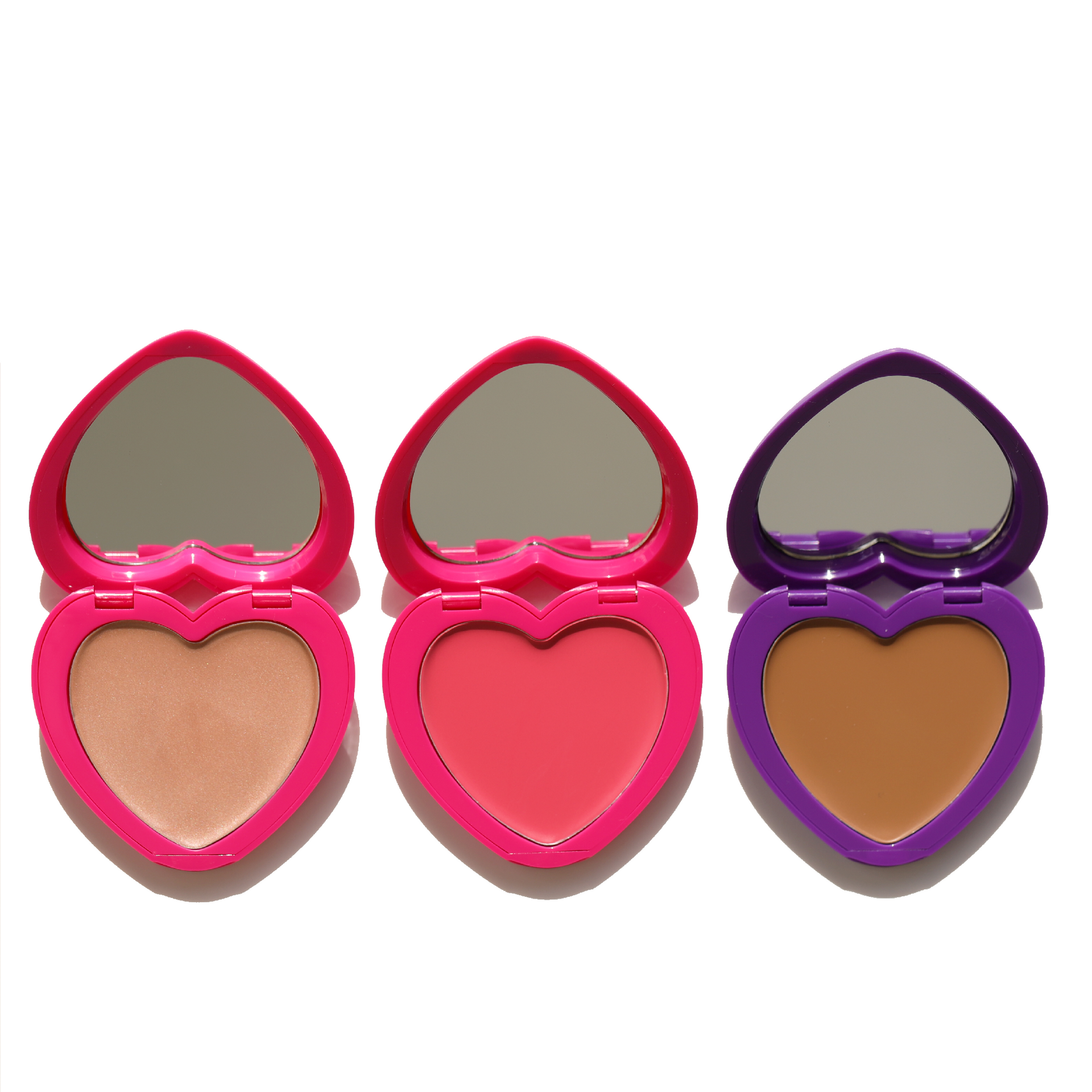 open pink and purple heart-shaped compact with mirror candy paint trifecta - half caked makeup