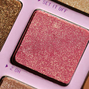 Close-up macro photo of the  pink shimmery eyeshadow shade 2 On in the Your Eyes Only Eyeshadow Palette by Half Caked