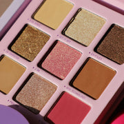 Interior photo of Half Caked Makeup’s Your Eyes Only Eyeshadow Palette shades in sunlight